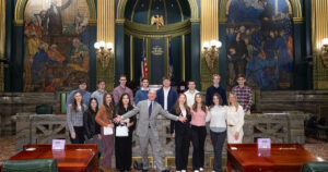 State Senator Marty Flynn with the Student Ambassador Program participants in the Senate Chamber, Harrisburg. Photo is attributable to Jimmie Brown, PA Senate Democratic Caucus. Media use permitted.